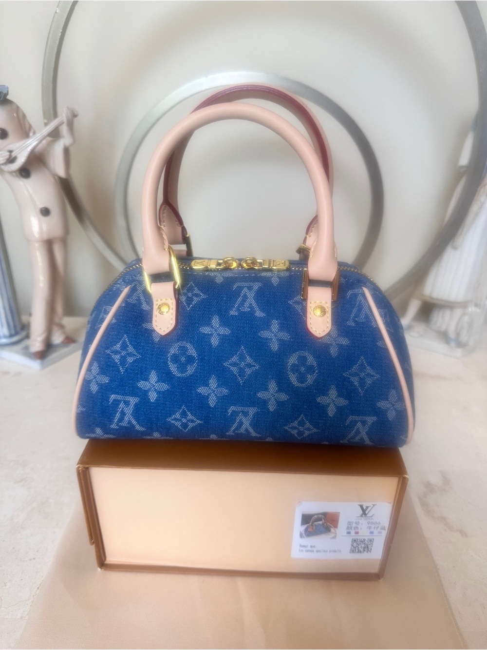 Lux inspired Nano Speedy bag is blue monogram denim. - Picture 6 of 16
